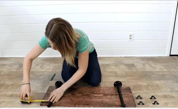 Step 4 fixing pipe on wooden board Step 4 fixing pipe on wooden board