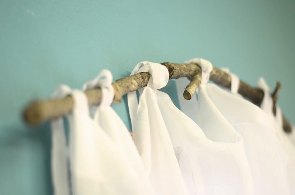 20 - Hang your Curtain with a Branch Rod