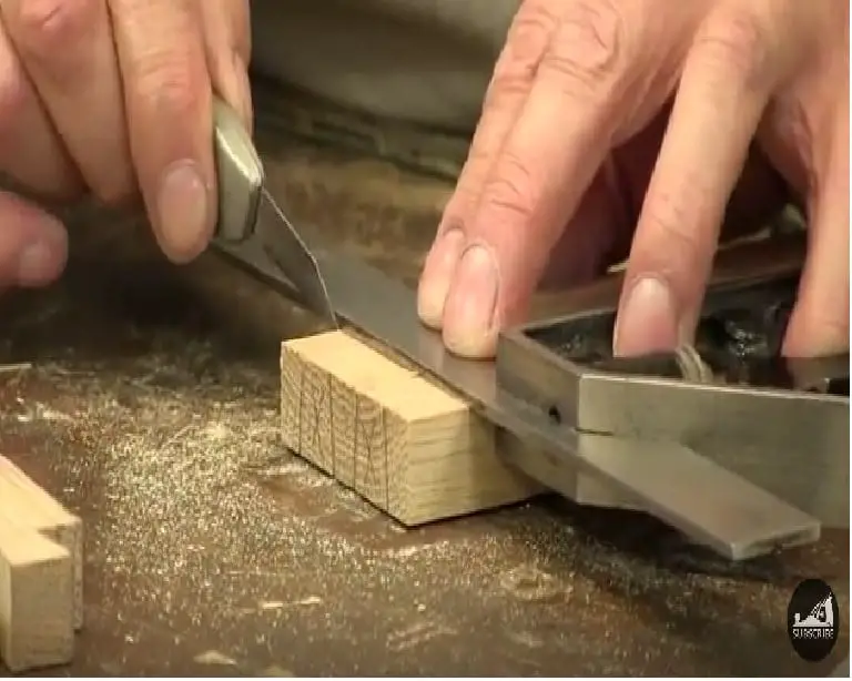 8 - Use a square to check for the fit of the two pieces of wood