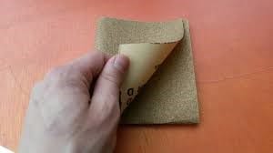 Use Sandpaper To Sand Off The Remaining Glue 1