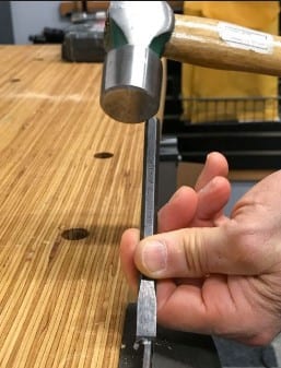 Using A Hammer And A Chisel 1