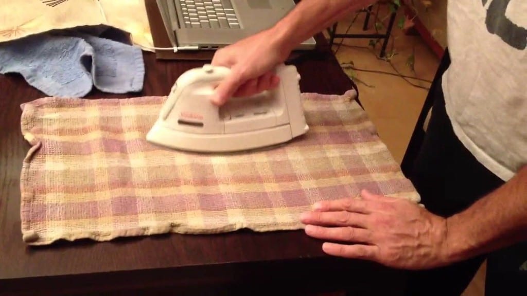 Use An Iron To Remove The Oil