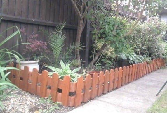 Repurposed Pallets Into Fence