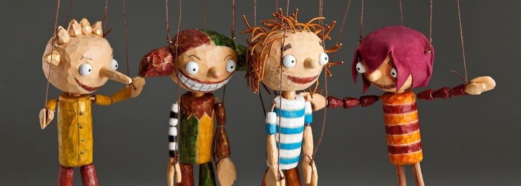 Traditionally Carved Puppets Based On Modern Day Characters
